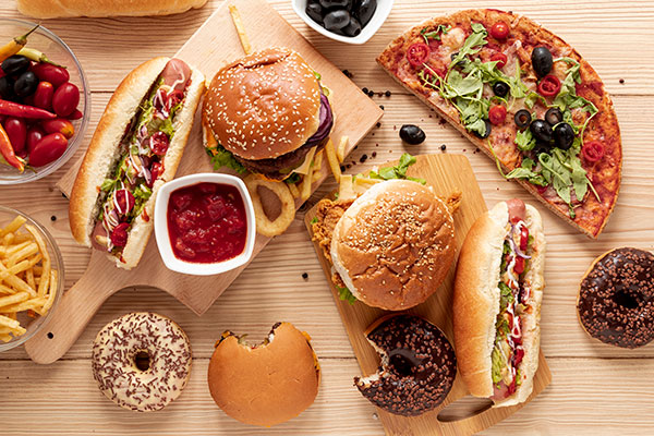 flat-lay-arrangement-with-burgers-pizza