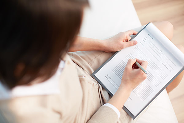 top-view-psychologist-writing-diagnosis