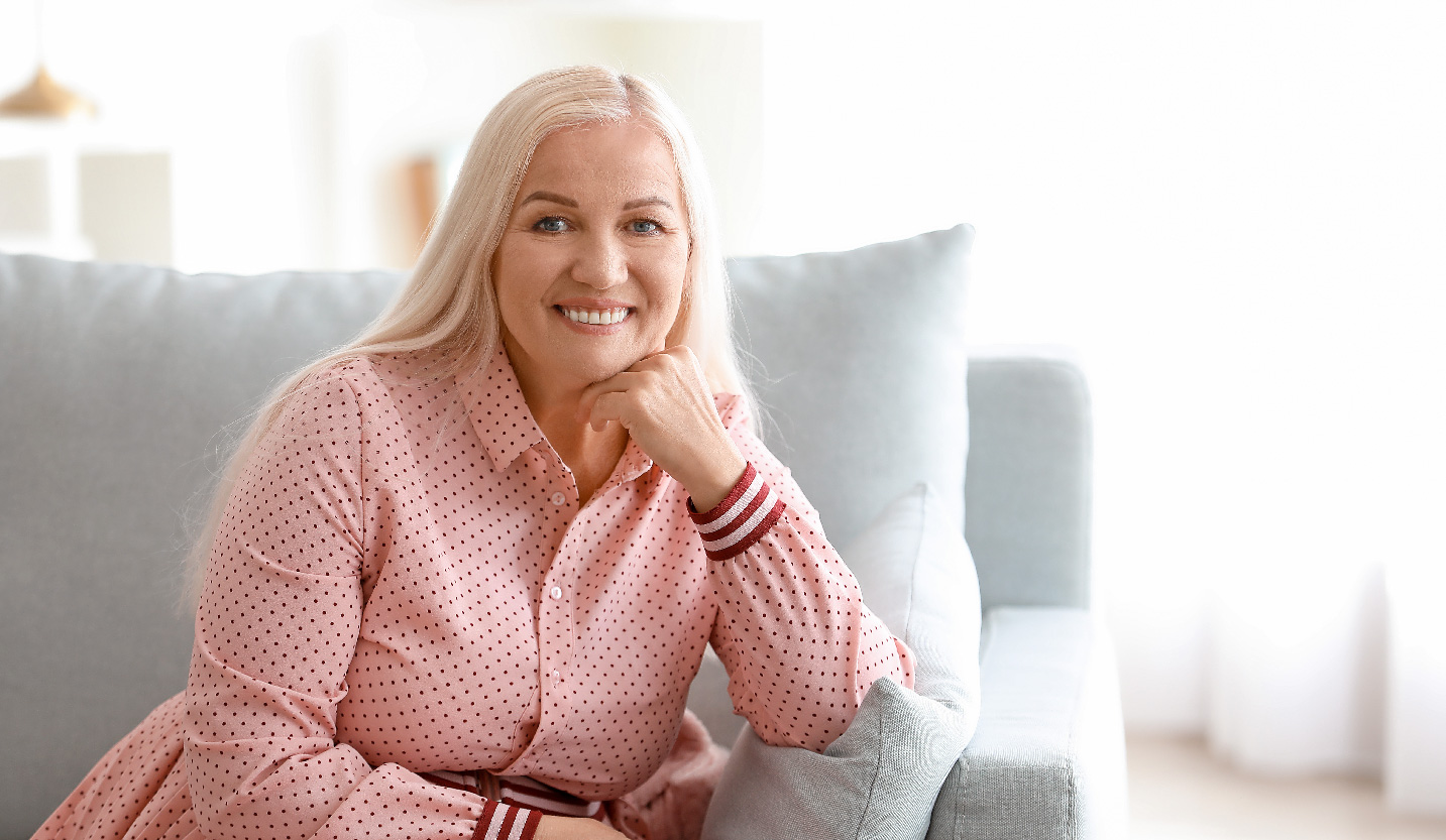 woman-sitting-on-couch